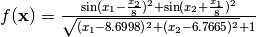 f(\mathbf{x}) = \frac{\sin(x_1 - \frac{x_2}{8})^2 +             \sin(x_2 + \frac{x_1}{8})^2}{\sqrt{(x_1 - 8.6998)^2 +             (x_2 - 6.7665)^2} + 1}